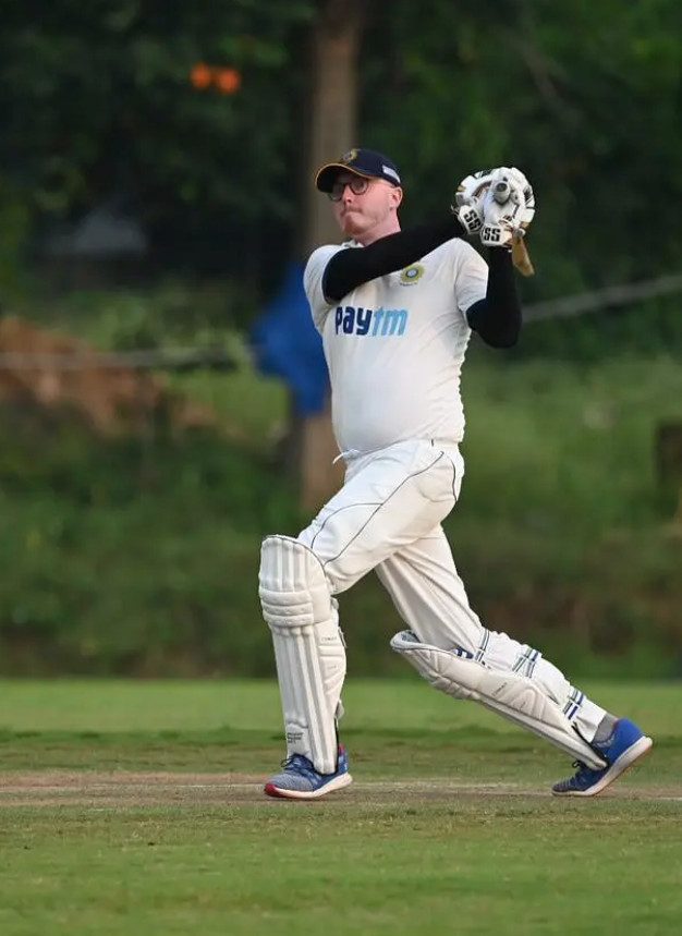 Maidan founder Sam Freeman batting in a club cricket match in India